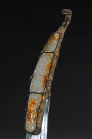 Gold and silver inlaid jade belt hook from the Warring States Period, China