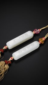 A pair of Hetian white jade pendants from the Qing Dynasty, China