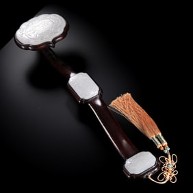 A Chinese Qing Dynasty Rosewood Inlaid with Hetian White Jade Ruyi Ornament