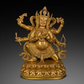 A Chinese Ming Dynasty Yongle Gilded Bronze Statue of the Buddha with Leaf Clothes