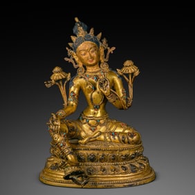A Chinese gilt bronze statue of Green Tara from the Yongle period of the Ming Dynasty