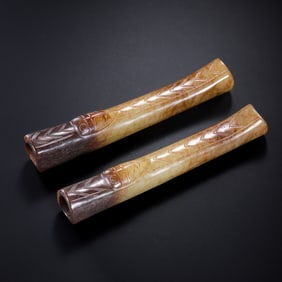 A pair of Chinese Han Dynasty jade flutes