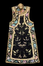 Chinese Qing Dynasty black satin long waistcoat with plum, orchid, bamboo and chrysanthemum pattern