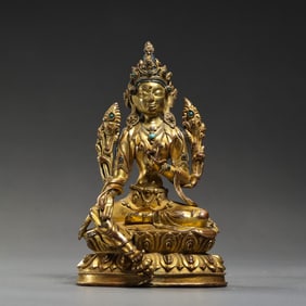 A Chinese Qing Dynasty Gilt Bronze and Turquoise Seated Buddha