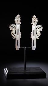 A pair of Chinese Han Dynasty Chilong jade pendants