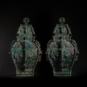 A pair of bronze vessels with animal-face patterns from the Shang and Zhou dynasties of China