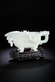 Chinese Qing Dynasty Hetian white jade dragon-shaped goblet with ring ears