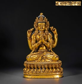 A Chinese gilt bronze statue of a seated Buddha from the Yongle period of the Ming Dynasty