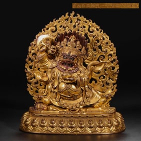A Chinese bronze statue of the God of Wealth from the Qianlong period of the Qing Dynasty
