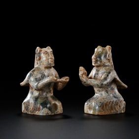 A pair of Chinese Han Dynasty jade kneeling figures