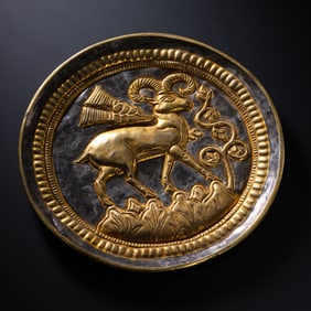 Ancient Persian gold and silver plate with sheep pattern