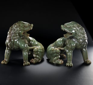 A pair of Hetian jade auspicious beasts from the Qing Dynasty, China