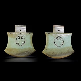 A pair of Chinese jade artifacts from the Shang and Zhou dynasties
