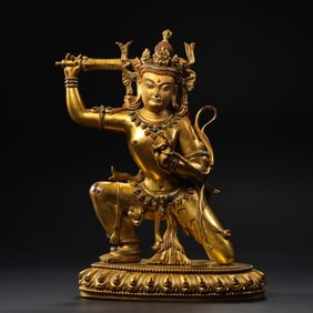 A Chinese Ming Dynasty Gilded Bronze Statue of Acala