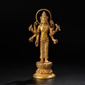 A West Asian Gilt-Bronze Standing Buddha