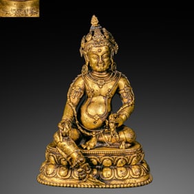 A Chinese Ming Dynasty gilded bronze statue of the God of Wealth