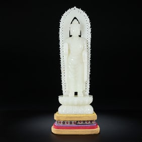 Standing Buddha statue of Hetian white jade from the Qing Dynasty, China