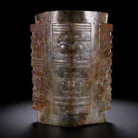 Chinese Neolithic jade cong with animal faces