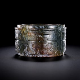 Chinese Neolithic jade cong with animal faces