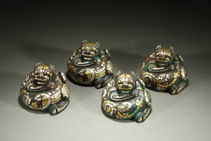 A group of auspicious beasts inlaid with gold and silver from the Warring States Period of China