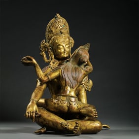 A Chinese Ming Dynasty Gilt Bronze Seated Statue of Happy Buddha