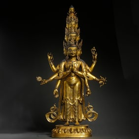 A Chinese Ming Dynasty Gilt Bronze and Gem-Inlaid Standing Buddha