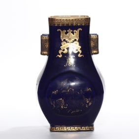 A Chinese Qing Dynasty Qianlong period blue glaze gilded bottle with ears