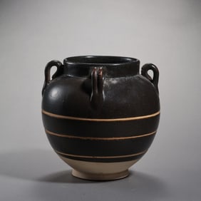 Chinese Tang Dynasty Gongxian kiln black glaze string pattern four-handled jar