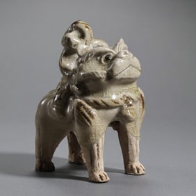 Chinese Sui Dynasty Xiangzhou Kiln Celadon Hu Man Riding a Lion