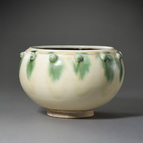 Chinese Tang Dynasty three-color drum-nail pattern jar