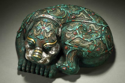 Gold and silver inlaid auspicious beasts from the Warring States Period of China