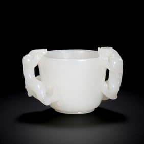 Chinese Qing Dynasty Hetian white jade cup with dragon pattern and two handles