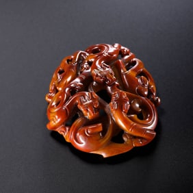 A red agate dragon pendant from the Warring States Period of China