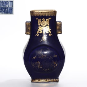 A Chinese Qing Dynasty Qianlong period blue-glazed gilded bottle with pierced ears