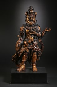 A Chinese Ming Dynasty gilt bronze standing Buddha statue