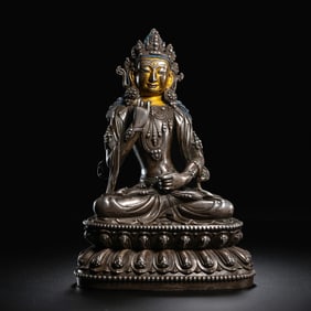 A Chinese gilt bronze statue of a seated Buddha from the Yongle period of the Ming Dynasty