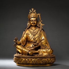 A gilt bronze statue of a seated Buddha from the Qianlong period of the Qing Dynasty, China