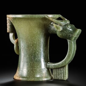 Chinese Han Dynasty jade ox-head cup with ring ears