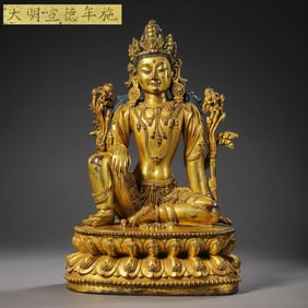 A Chinese gilt bronze statue of a seated Buddha from the Xuande period of the Ming Dynasty