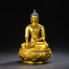 A Chinese Qing Dynasty gilt bronze Mongolian Buddha statue
