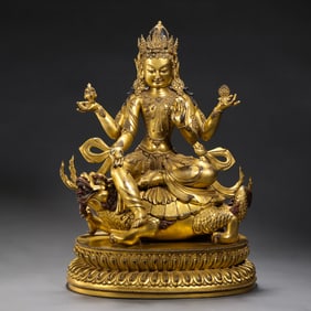 A Chinese gilt bronze statue of a seated Buddha from the Yongle period of the Ming Dynasty