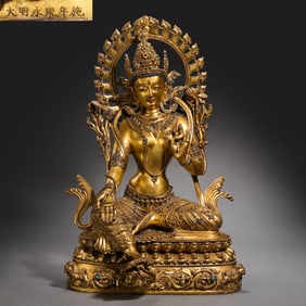 A Chinese gilt bronze statue of a seated Buddha from the Yongle period of the Ming Dynasty