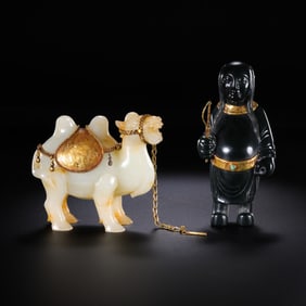 A group of Chinese Liao Dynasty Hetian jade figures of foreigners leading camels