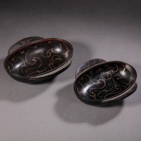 A pair of Chinese Han Dynasty wooden painted cups with earrings
