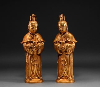 A pair of silver-gilt human-shaped flasks from the Liao Dynasty, China