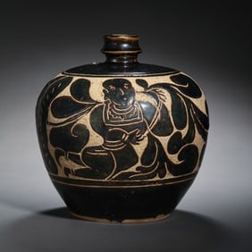 Chinese Northern Song Dynasty Cizhou kiln black glaze carved figure vase