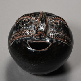 Chinese Northern Song Dynasty Cizhou kiln black-glazed human-faced water pot