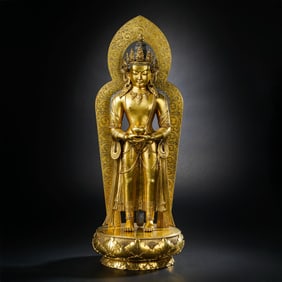 A Chinese Qing Dynasty gilt-bronze standing Mongolian Buddha statue