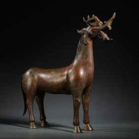 Gold and silver inlaid auspicious beasts from the Warring States Period of China