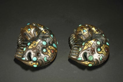 A pair of Chinese Warring States Period gold, silver and turquoise inlaid auspicious beast charms